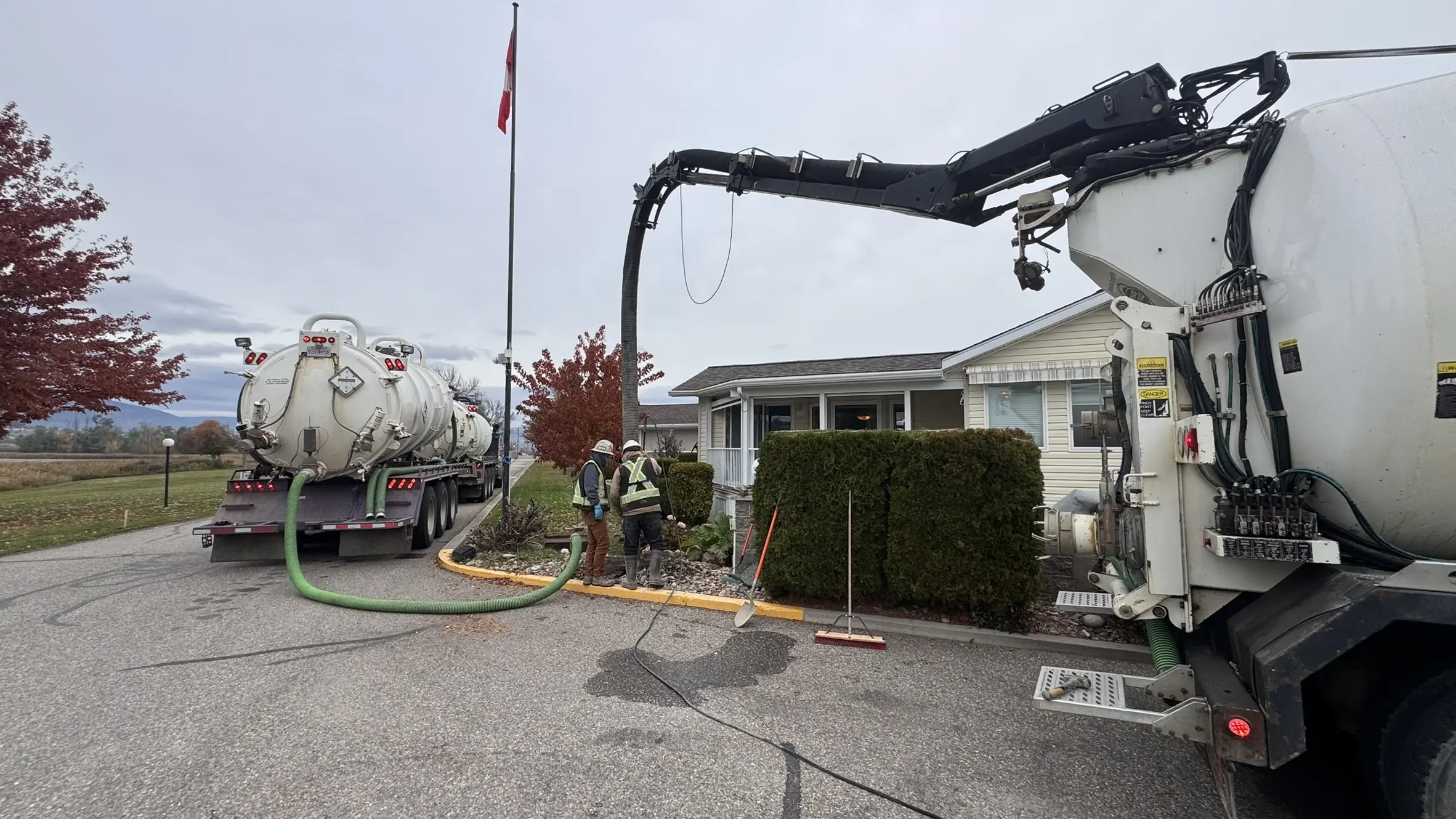AAA Septic vacuum trucks servicing an Okanagan property